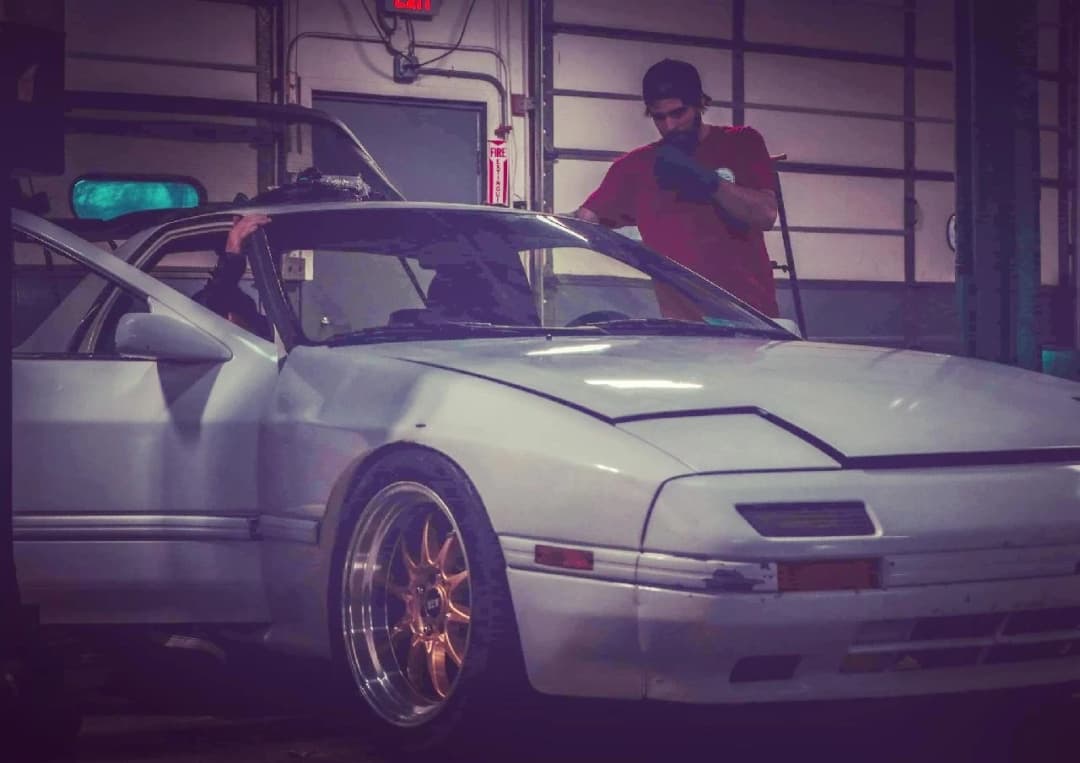 Midwest Mechanix Xavier Working on Car